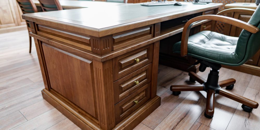 Executive cabinet with wooden office desk in classic style close up