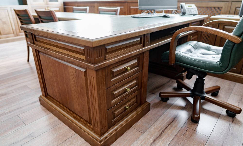Executive cabinet with wooden office desk in classic style close up